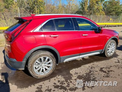 Trzecie zdjęcie samochodu z tyłu: 2023 CADILLAC XT4 PREMIUM LUXURY VIN:1GYFZCR4XPF185943 - miniatura