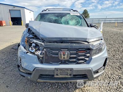 Piąte zdjęcie samochodu w środku: 2022 HONDA PASSPORT TRAIL SPORT VIN:5FNYF8H65NB022769 - miniatura