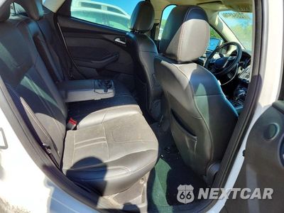 Zdjęcie 10 z 13 samochodu: 2013 FORD FOCUS TITANIUM VIN:1FADP3J21DL116879 - miniatura