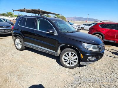 Czwarte zdjęcie samochodu z boku: 2013 VOLKSWAGEN TIGUAN S VIN:WVGAV3AX8DW598193 - miniatura