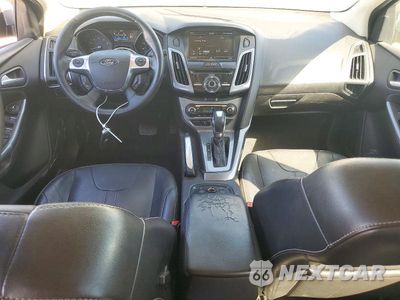 Zdjęcie 8 z 12 samochodu: 2013 FORD FOCUS TITANIUM VIN:1FADP3N2XDL370343 - miniatura