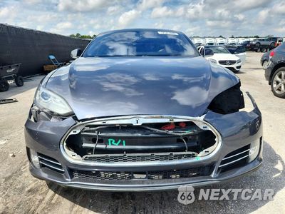 Piąte zdjęcie samochodu w środku: 2014 TESLA MODEL S VIN:5YJSA1H11EFP59595 - miniatura