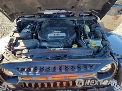 Zdjęcie 11 z 12 samochodu: 2016 JEEP WRANGLER UNLIMITED SAHARA VIN:1C4BJWEG3GL153074 - miniatura