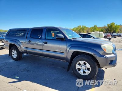 Czwarte zdjęcie samochodu z boku: 2014 TOYOTA TACOMA DOUBLE CAB LONG BED VIN:3TMMU4FN4EM069214 - miniatura