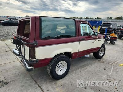 Trzecie zdjęcie samochodu z tyłu: 1990 FORD BRONCO VIN:1FMCU14T5LUA33015 - miniatura