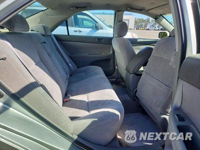 Zdjęcie 10 z 12 samochodu: 2003 TOYOTA CAMRY LE VIN:JTDBE32K430153690 - miniatura