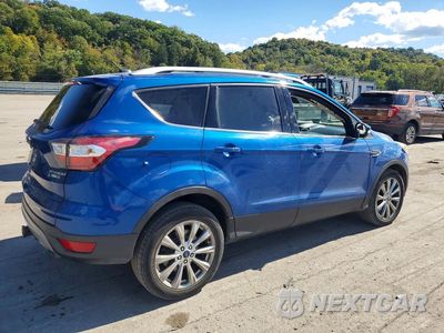 Trzecie zdjęcie samochodu z tyłu: 2017 FORD ESCAPE TITANIUM VIN:1FMCU9J94HUA47454 - miniatura