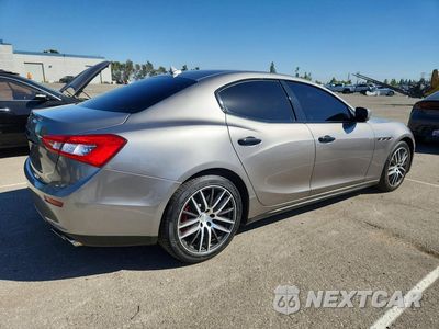 Trzecie zdjęcie samochodu z tyłu: 2014 MASERATI GHIBLI S VIN:ZAM57RTA6E1088429 - miniatura