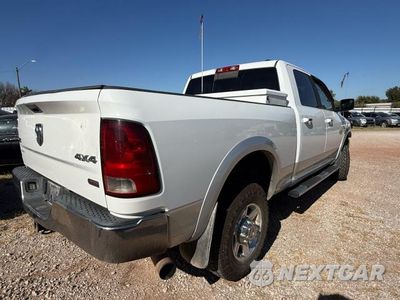 Czwarte zdjęcie samochodu z boku: 2012 DODGE RAM 2500 LARAMIE VIN:3C6UD5FLXCG128029 - miniatura