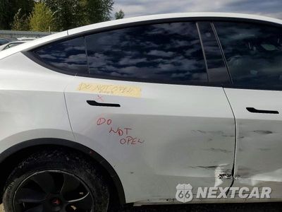 Zdjęcie 11 z 14 samochodu: 2023 TESLA MODEL Y VIN:7SAYGDEE2PF662882 - miniatura