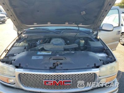 Zdjęcie 12 z 13 samochodu: 2001 GMC DENALI VIN:1GKEK63U41J263609 - miniatura