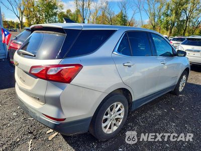 Trzecie zdjęcie samochodu z tyłu: 2018 CHEVROLET EQUINOX LT VIN:2GNAXSEV6J6299364 - miniatura
