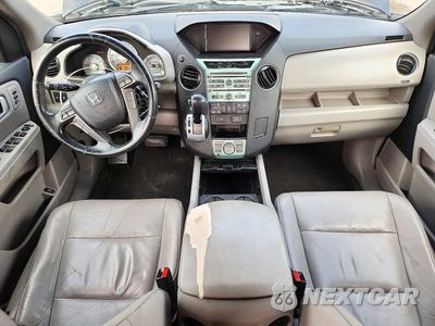 Zdjęcie 8 z 13 samochodu: 2011 HONDA PILOT TOURING VIN:5FNYF3H93BB047405 - miniatura