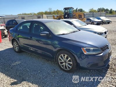 Czwarte zdjęcie samochodu z boku: 2012 VOLKSWAGEN JETTA SE VIN:3VWDX7AJ1CM451790 - miniatura