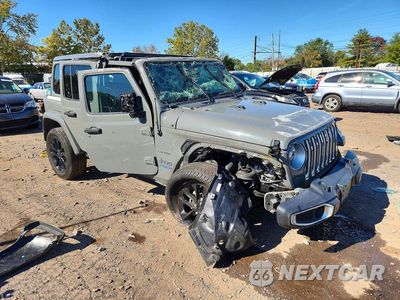Czwarte zdjęcie samochodu z boku: 2021 JEEP WRANGLER UNLIMITED SAHARA 4XE VIN:1C4JJXP65MW642866 - miniatura