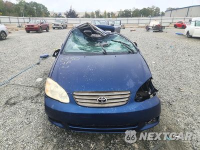 Piąte zdjęcie samochodu w środku: 2003 TOYOTA COROLLA LE VIN:1NXBR32E83Z148804 - miniatura