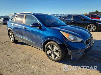 Czwarte zdjęcie samochodu z boku: 2018 KIA NIRO EX VIN:KNDCC3LC7J5123410 - miniatura