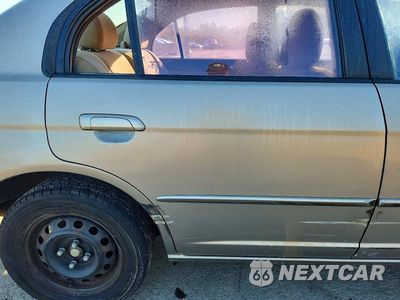 Zdjęcie 10 z 12 samochodu: 2003 HONDA CIVIC LX VIN:2HGES16543H581836 - miniatura