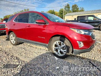 Czwarte zdjęcie samochodu z boku: 2019 CHEVROLET EQUINOX LT VIN:3GNAXVEX2KS500442 - miniatura