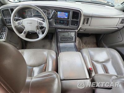 Zdjęcie 8 z 14 samochodu: 2003 GMC YUKON DENALI VIN:1GKEK63U23J285708 - miniatura