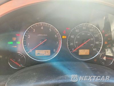 Zdjęcie 9 z 12 samochodu: 2004 INFINITI FX45 BASE VIN:JNRBS08W64X404008 - miniatura