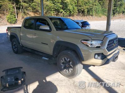 Czwarte zdjęcie samochodu z boku: 2019 TOYOTA TACOMA TRD OFF-ROAD VIN:5TFCZ5AN6KX181352 - miniatura