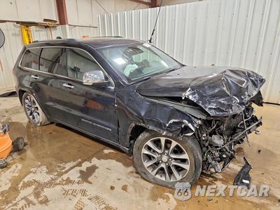 Czwarte zdjęcie samochodu z boku: 2017 JEEP GRAND CHEROKEE OVERLAND VIN:1C4RJFCG9HC836576 - miniatura