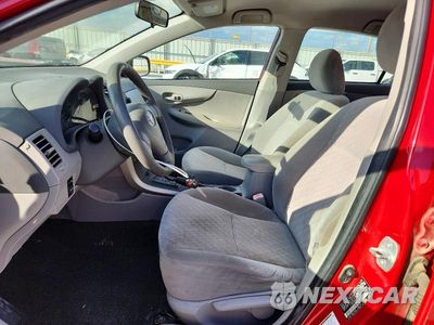 Zdjęcie 7 z 12 samochodu: 2009 TOYOTA COROLLA LE VIN:JTDBL40E69J051335 - miniatura