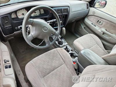 Zdjęcie 8 z 12 samochodu: 2004 TOYOTA TACOMA BASE VIN:5TEVL52N34Z313858 - miniatura