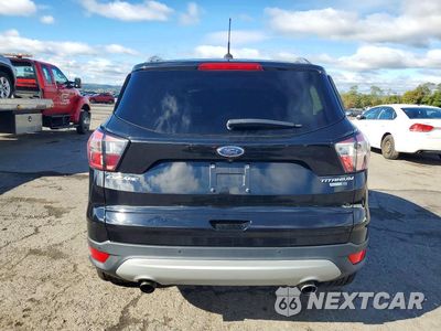 Zdjęcie 6 z 13 samochodu: 2017 FORD ESCAPE TITANIUM VIN:1FMCU9J98HUE43855 - miniatura