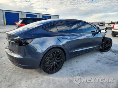 Trzecie zdjęcie samochodu z tyłu: 2019 TESLA MODEL 3 VIN:5YJ3E1EA5KF313085 - miniatura