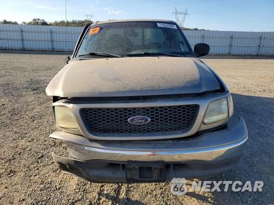 Piąte zdjęcie samochodu w środku: 2002 FORD F150 VIN:1FTRX17L22NA71473 - miniatura