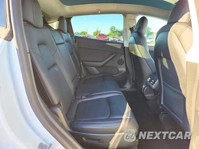 Zdjęcie 10 z 12 samochodu: 2022 TESLA MODEL Y VIN:7SAYGAEE9NF515647 - miniatura