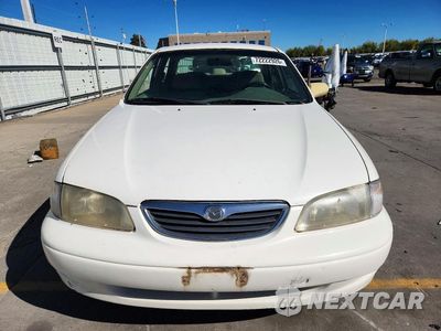 Piąte zdjęcie samochodu w środku: 1998 MAZDA 626 DX VIN:1YVGF22C4W5735957 - miniatura