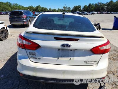 Zdjęcie 6 z 13 samochodu: 2013 FORD FOCUS TITANIUM VIN:1FADP3J21DL116879 - miniatura