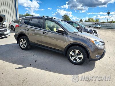 Czwarte zdjęcie samochodu z boku: 2015 TOYOTA RAV4 XLE VIN:JTMRFREV0FD157527 - miniatura