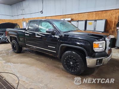 Czwarte zdjęcie samochodu z boku: 2014 GMC SIERRA K1500 SLT VIN:1GTV2VEC1EZ275525 - miniatura