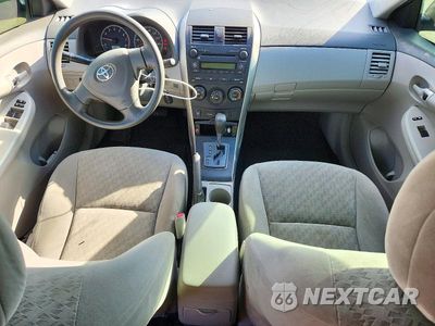Zdjęcie 8 z 13 samochodu: 2009 TOYOTA COROLLA LE VIN:JTDBL40E499067695 - miniatura