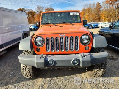 Piąte zdjęcie samochodu w środku: 2015 JEEP WRANGLER UNLIMITED SPORT VIN:1C4BJWDG5FL631902 - miniatura