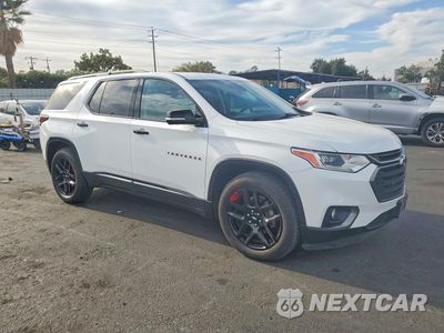 Czwarte zdjęcie samochodu z boku: 2019 CHEVROLET TRAVERSE PREMIER VIN:1GNEVKKW8KJ286267 - miniatura
