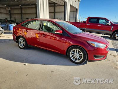 Czwarte zdjęcie samochodu z boku: 2016 FORD FOCUS SE VIN:1FADP3F29GL293709 - miniatura