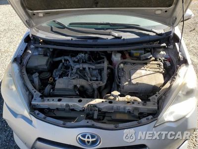 Zdjęcie 11 z 12 samochodu: 2013 TOYOTA PRIUS C TWO VIN:JTDKDTB30D1038530 - miniatura
