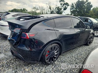 Trzecie zdjęcie samochodu z tyłu: 2024 TESLA MODEL Y VIN:7SAYGDEF8RF045627 - miniatura