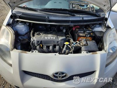 Zdjęcie 12 z 13 samochodu: 2010 TOYOTA YARIS BASE VIN:JTDKT4K39A5281444 - miniatura
