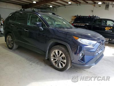 Czwarte zdjęcie samochodu z boku: 2019 TOYOTA RAV4 LIMITED VIN:JTMN1RFV0KD007519 - miniatura