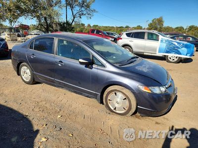Czwarte zdjęcie samochodu z boku: 2007 HONDA CIVIC HYBRID VIN:JHMFA36257S001238 - miniatura
