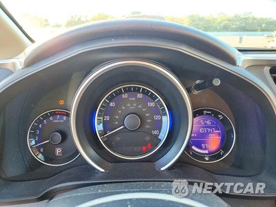 Zdjęcie 9 z 13 samochodu: 2016 HONDA FIT LX VIN:JHMGK5H57GX026603 - miniatura
