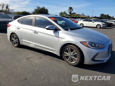 Czwarte zdjęcie samochodu z boku: 2018 HYUNDAI ELANTRA VALUE EDITION VIN:5NPD84LF8JH306921 - miniatura