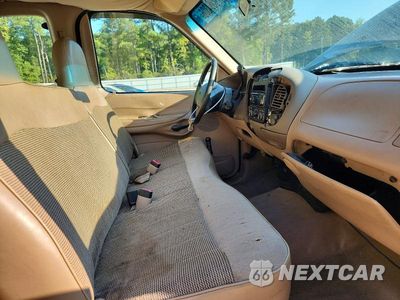 Zdjęcie 7 z 13 samochodu: 1997 FORD F150 VIN:1FTDX1728VNC43267 - miniatura