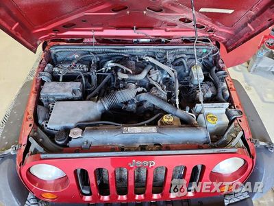 Zdjęcie 12 z 13 samochodu: 2011 JEEP WRANGLER UNLIMITED SPORT VIN:1J4BA3H1XBL552007 - miniatura